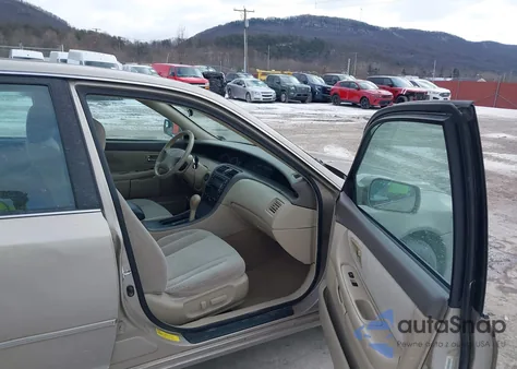 2000 Toyota Avalon Xl from USA, damaged, VIN 4T1BF28B9YU088071